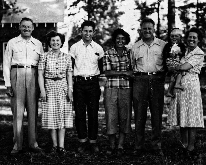 Photograph of the Herz family in 1949. L to R: Fred Herz, Dorothy Herz, Wilton Herz, Marce Herz, Walter Herz, Howard Herz, and Hildegard Herz.